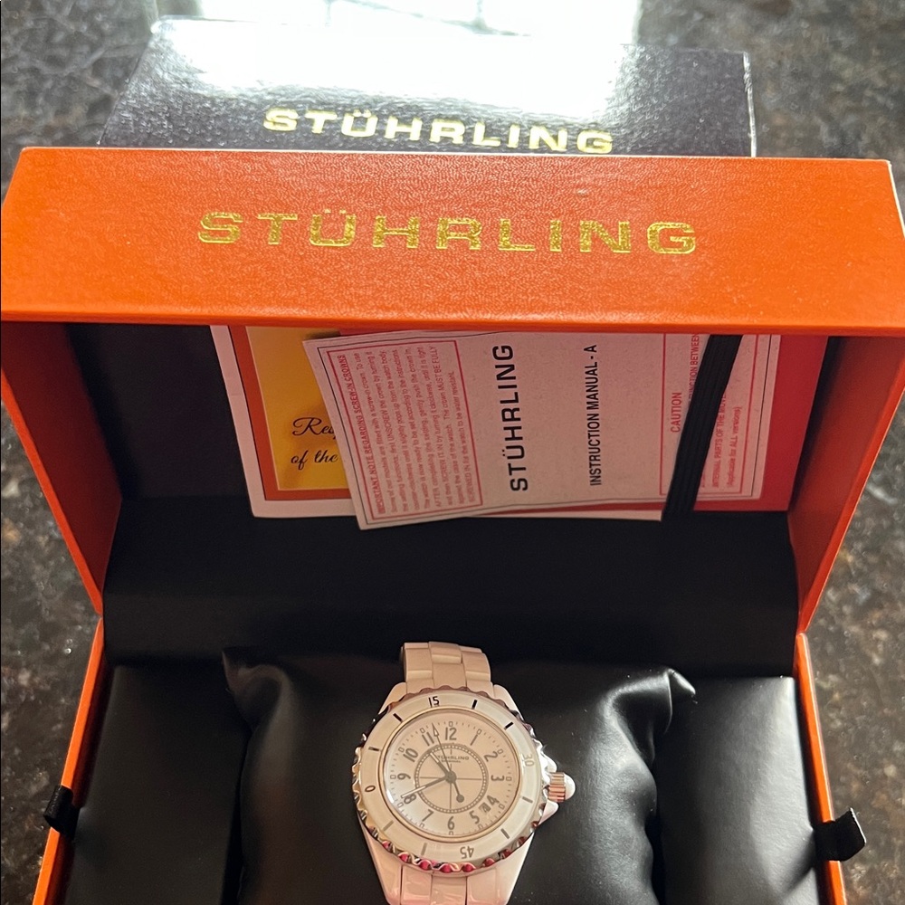 Auth Sturhling White Ceramic Watch in Original Box. Needs battery